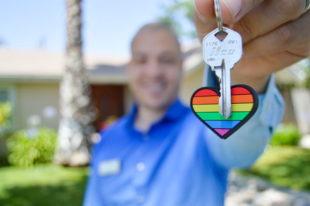 A realtor holding a key